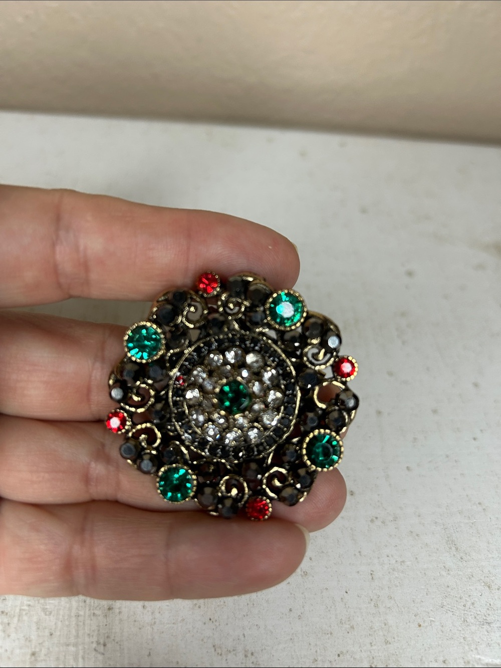 Vintage-Inspired Gold Tone Brooch with Green and Red Crystals
